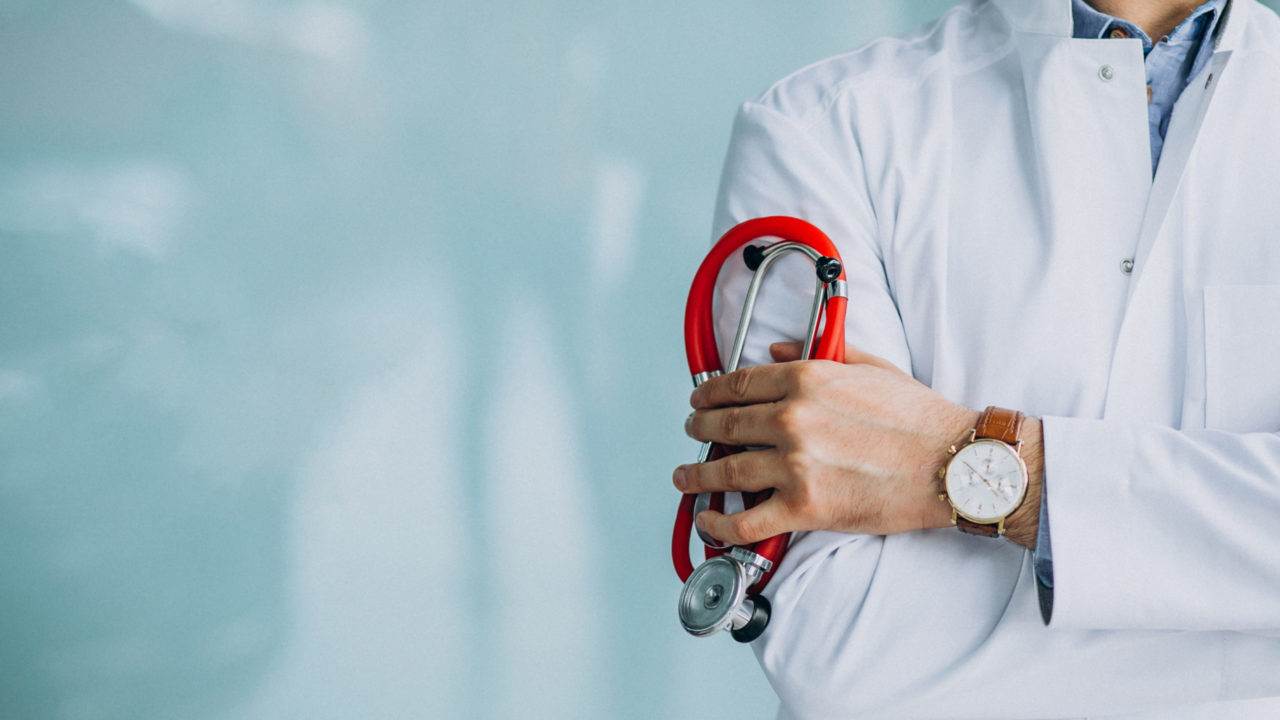 young-handsome-physician-in-a-medical-robe-with-stethoscope-scaled-e1613468072983-1280x720.jpg